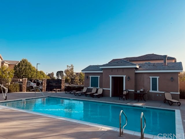 610 West Woodcrest Street Rialto, CA 92376 - Photo 33 of 33 a view of a house with a patio