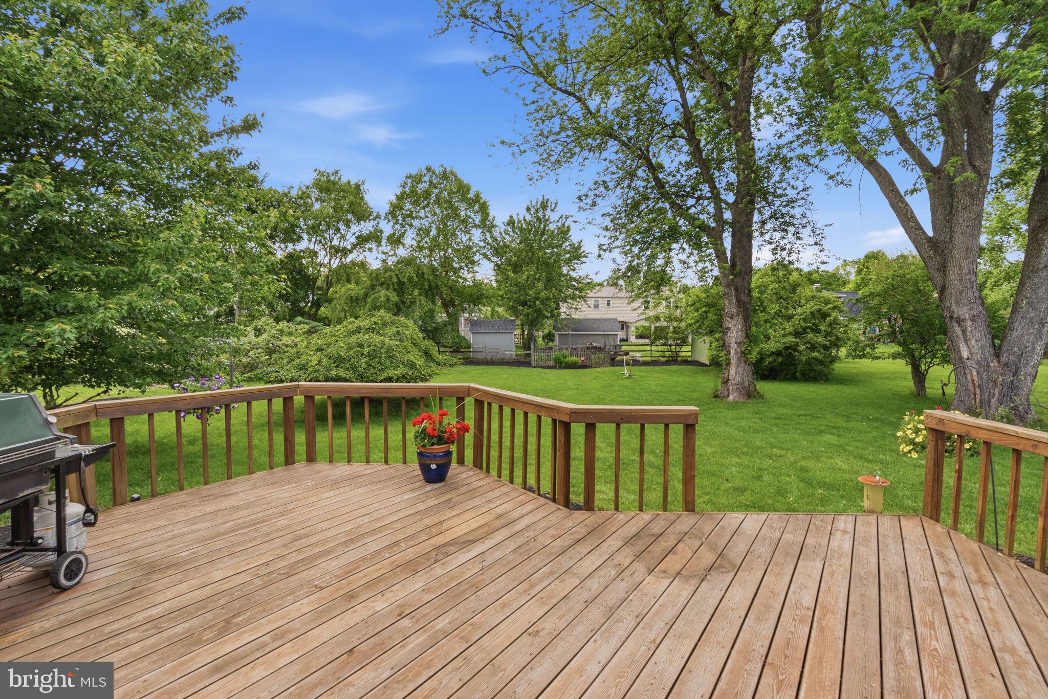 81 Cherokee Road Doylestown, PA 18901 - Photo 28 of 43 a view of balcony with deck and a garden