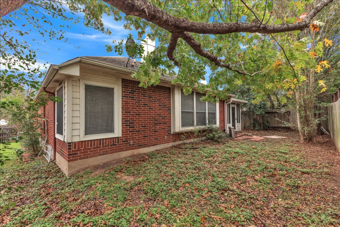 9237 La Siesta Bend Austin, TX 78749 - Photo 29 of 29 a view of a house with a yard and tree
