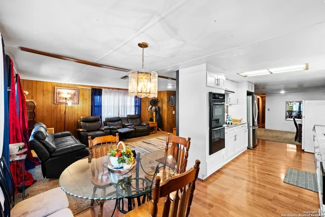 a view of a dining room with furniture