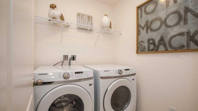 3592 Summitview Drive Lakeland, FL 33803 - Photo 18 of 23 a utility room with dryer and washer
