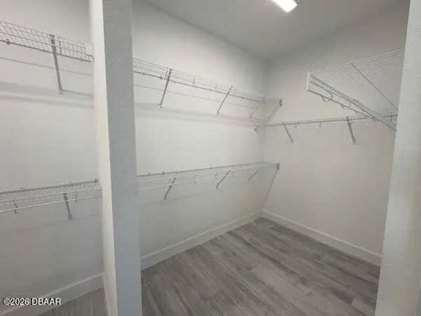 a view of a room with racks on the wall