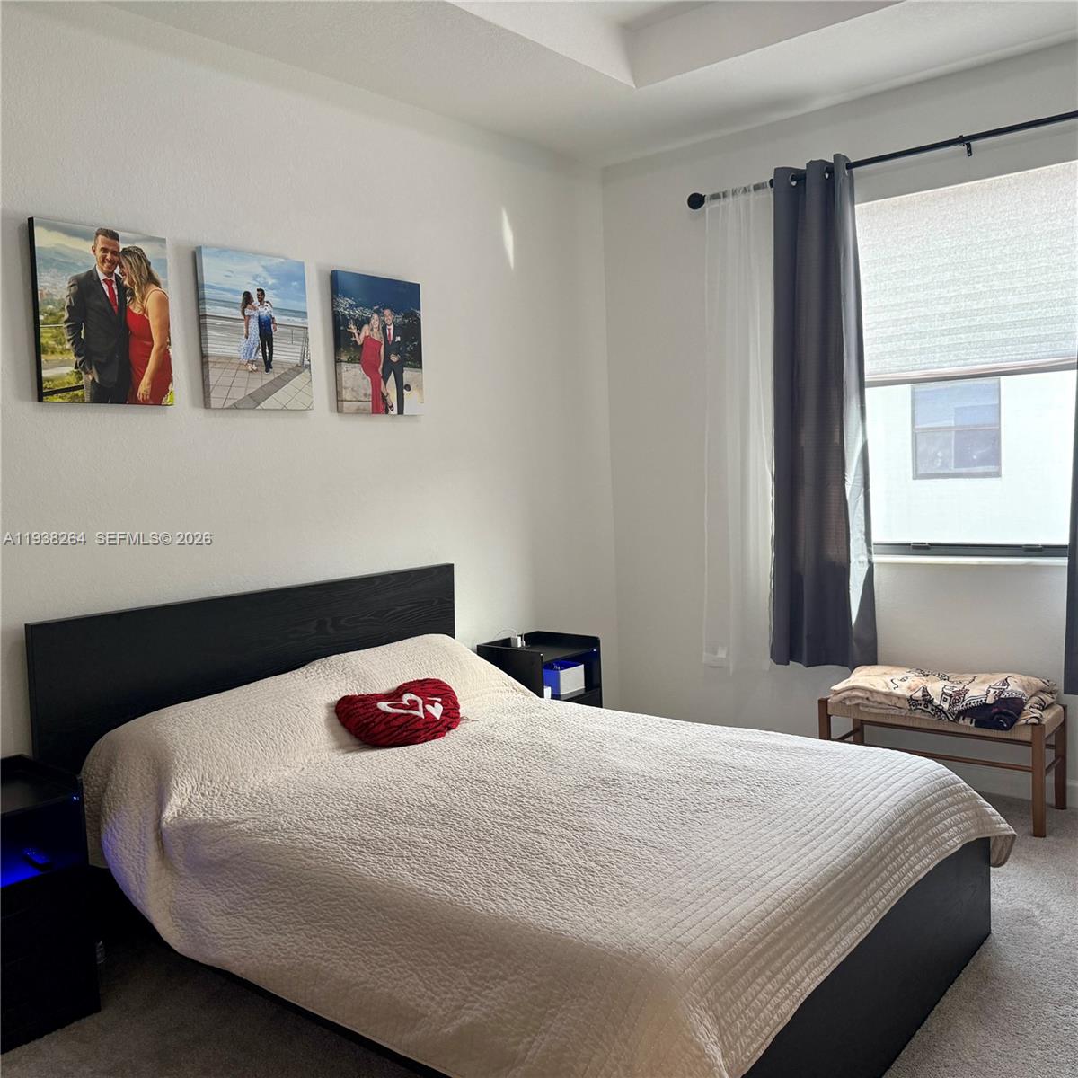 23049 Southwest 129th Place Miami, FL 33177 - Photo 22 of 33 a bedroom with a bed and a window