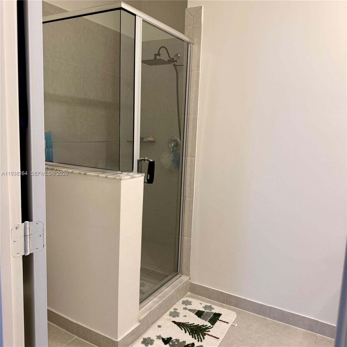 23049 Southwest 129th Place Miami, FL 33177 - Photo 27 of 33 a bathroom with a shower