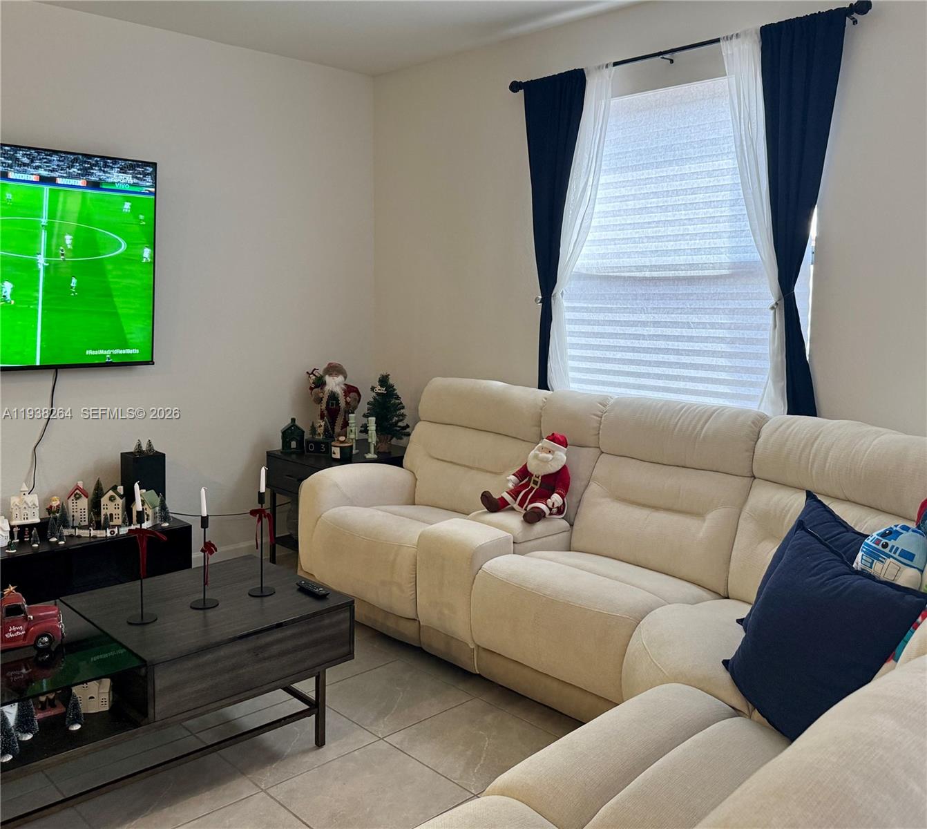 23049 Southwest 129th Place Miami, FL 33177 - Photo 6 of 33 a living room with furniture and a window