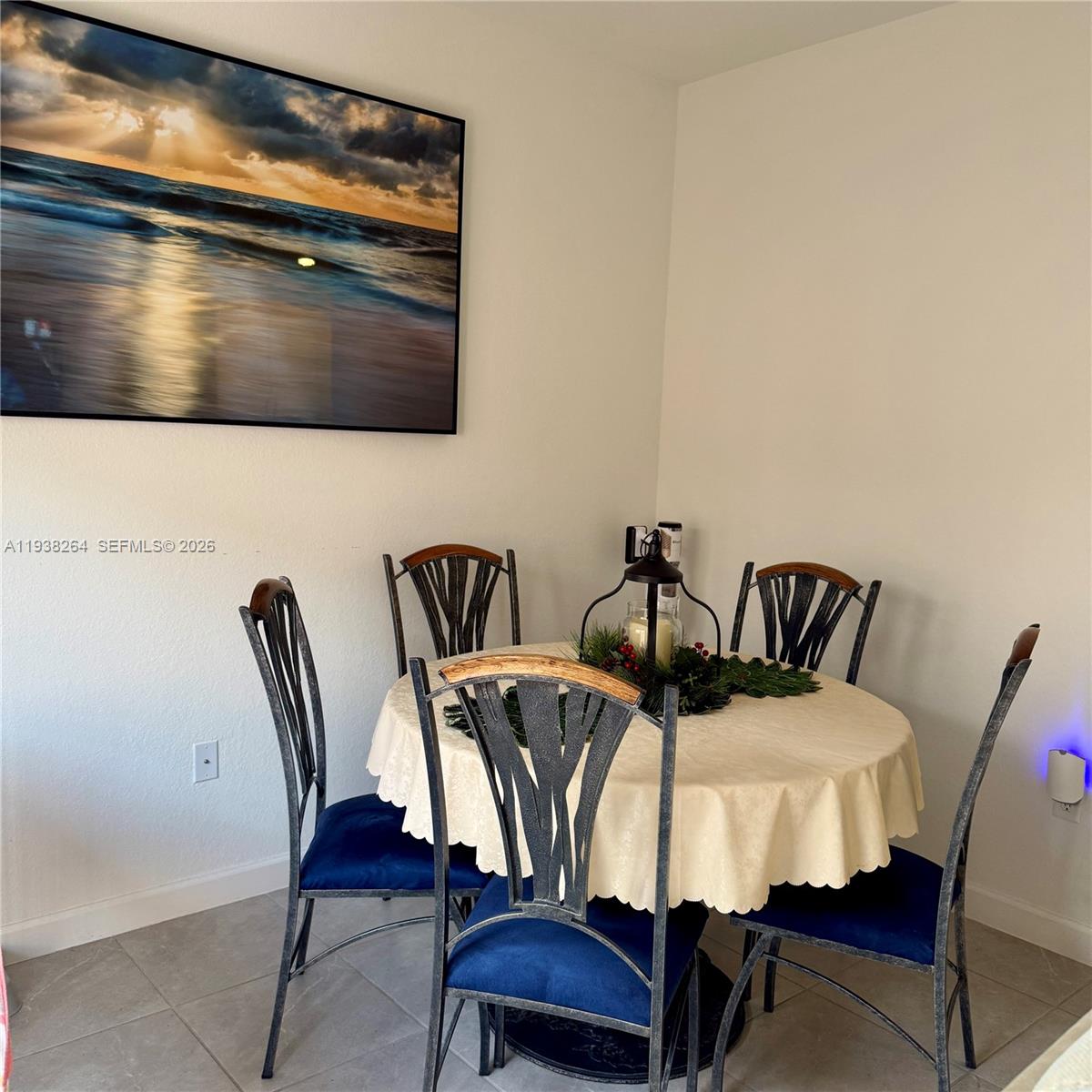 23049 Southwest 129th Place Miami, FL 33177 - Photo 9 of 33 a view of a dining room with furniture and wooden floor
