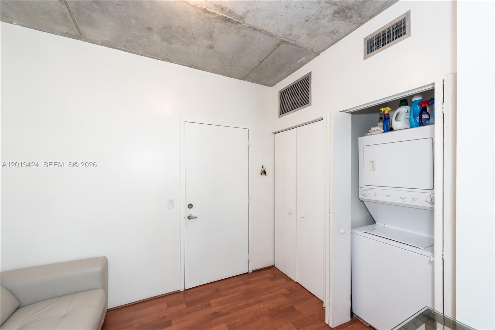 690 Southwest 1st Court, Unit 1034 Miami, FL 33130 - Photo 12 of 12 a view of storage and utility room with washer and dryer