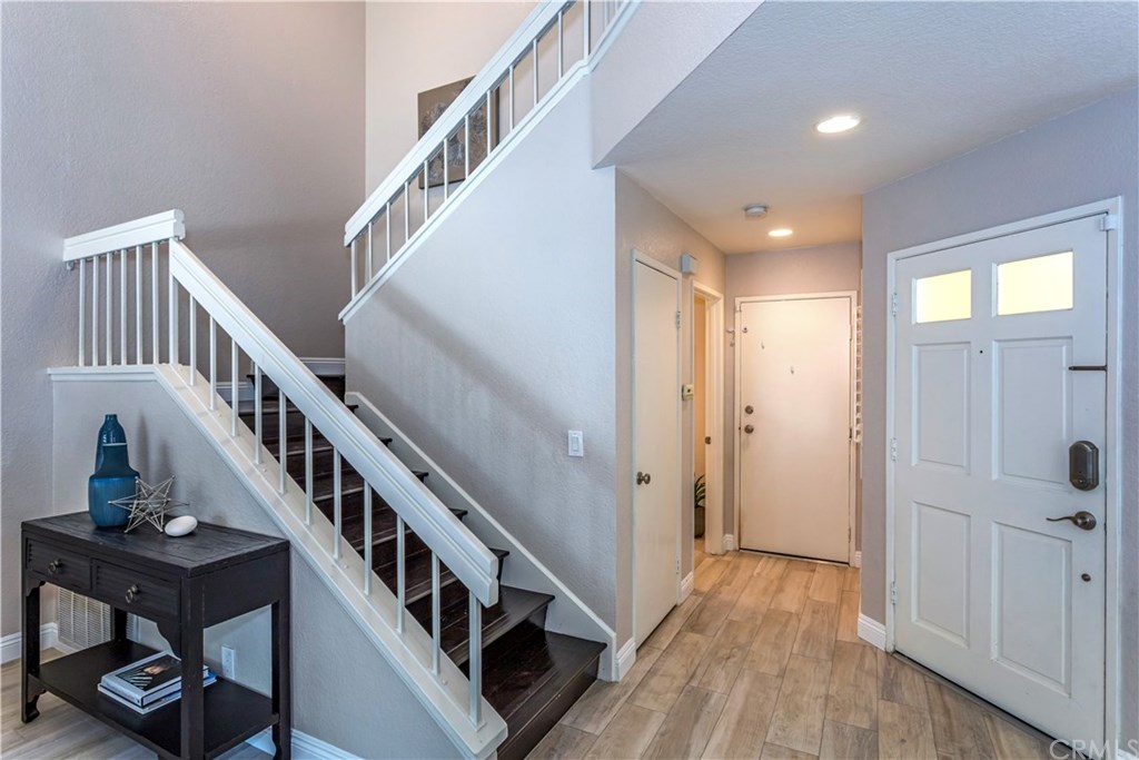 11 Silveroak Aliso Viejo, CA 92656 - Photo 11 of 41 a view of an entryway with wooden floor and stairs