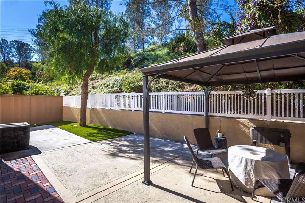 11 Silveroak Aliso Viejo, CA 92656 - Photo 13 of 41 a view of backyard with barbeque grill and outdoor seating