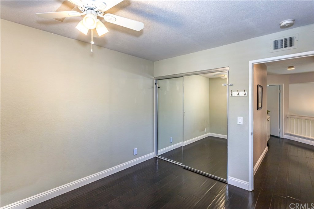 11 Silveroak Aliso Viejo, CA 92656 - Photo 26 of 41 an empty room with wooden floor fan and windows