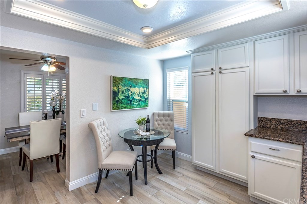 11 Silveroak Aliso Viejo, CA 92656 - Photo 9 of 41 a view of a dining room with furniture and wooden floor