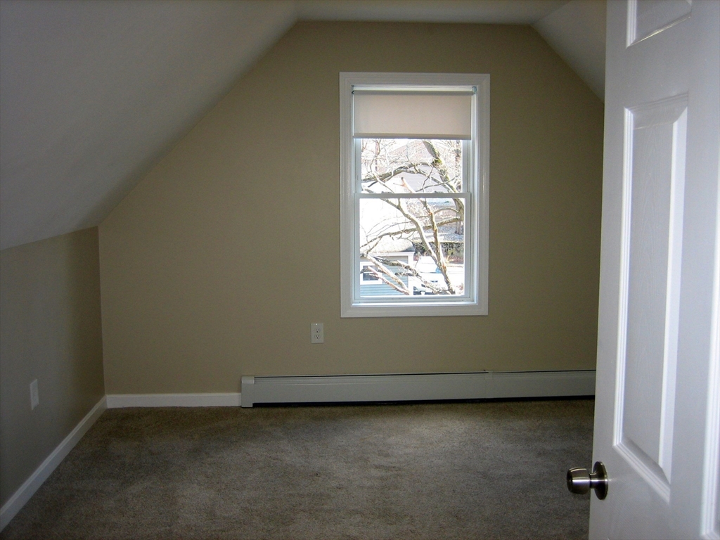 9 Pearl Street, Unit 2 Ayer, MA 01432 - Photo 7 of 10 an empty room with a window