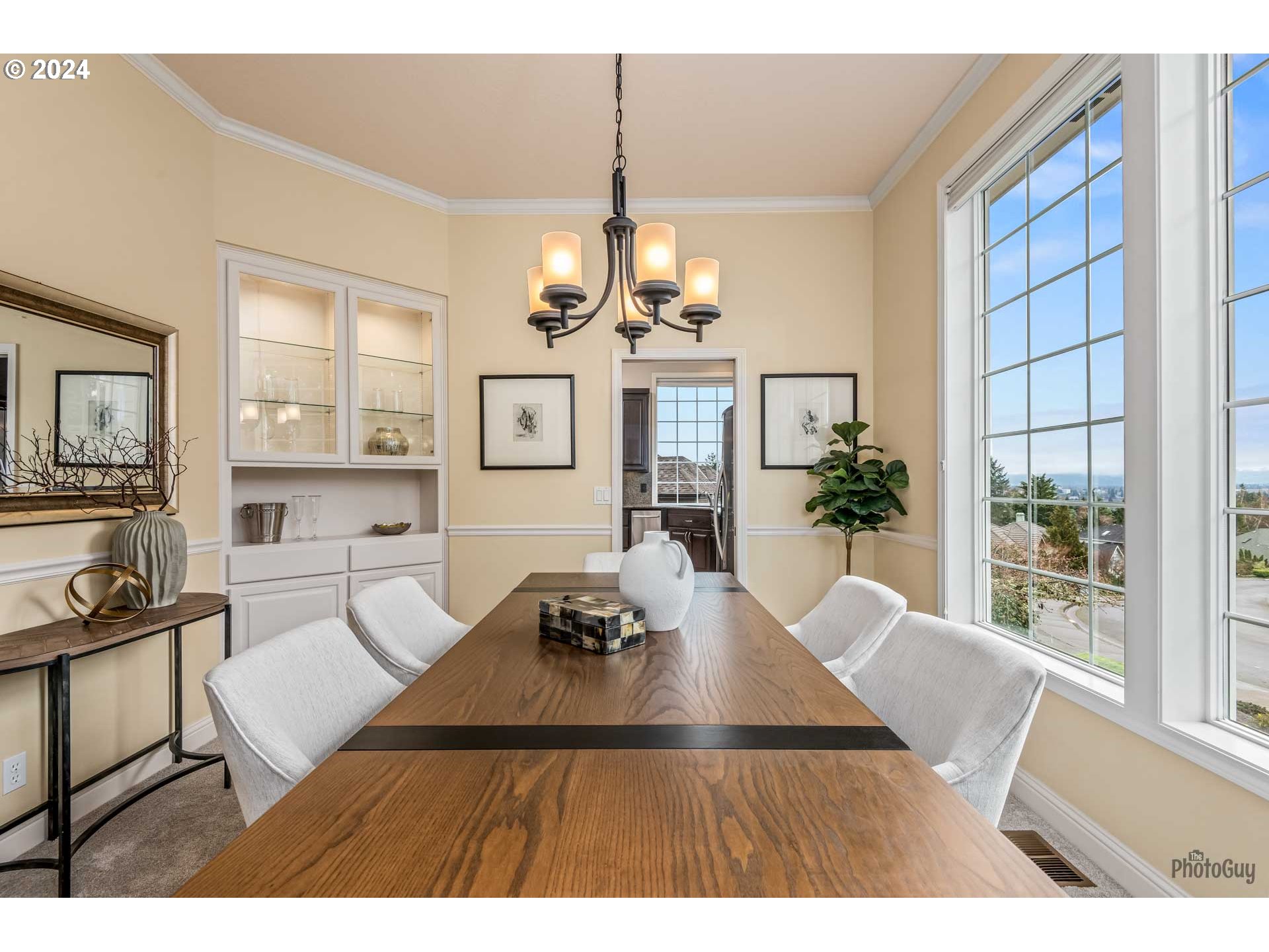 2054 Morning View Drive Eugene, OR 97405 - Photo 12 of 48 a living room with furniture a chandelier and a dining table