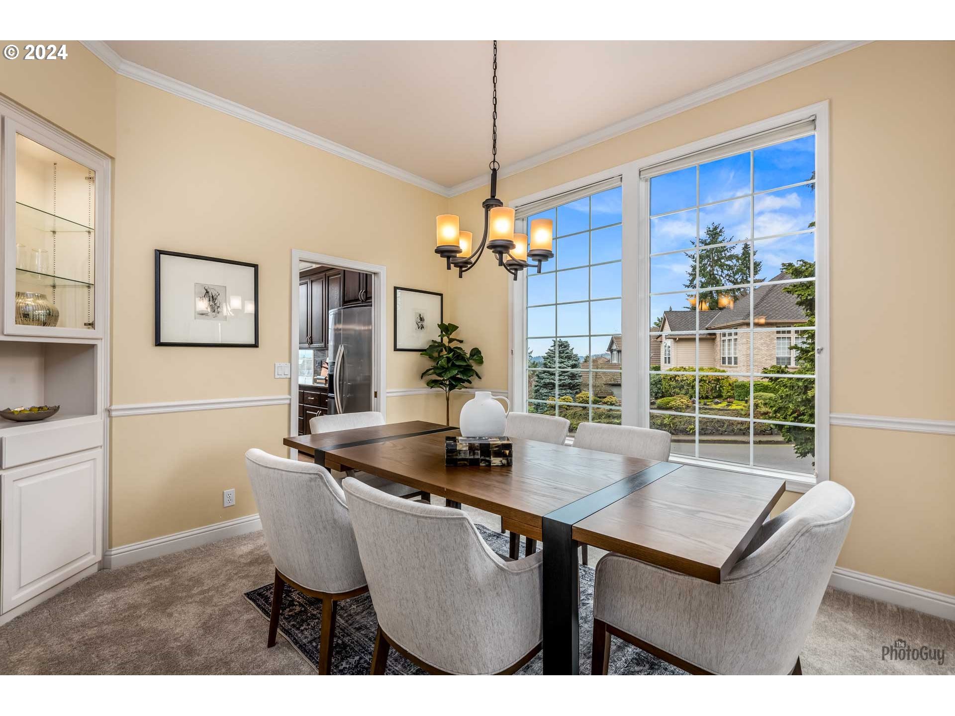 2054 Morning View Drive Eugene, OR 97405 - Photo 13 of 48 a kitchen with a table chairs and refrigerator
