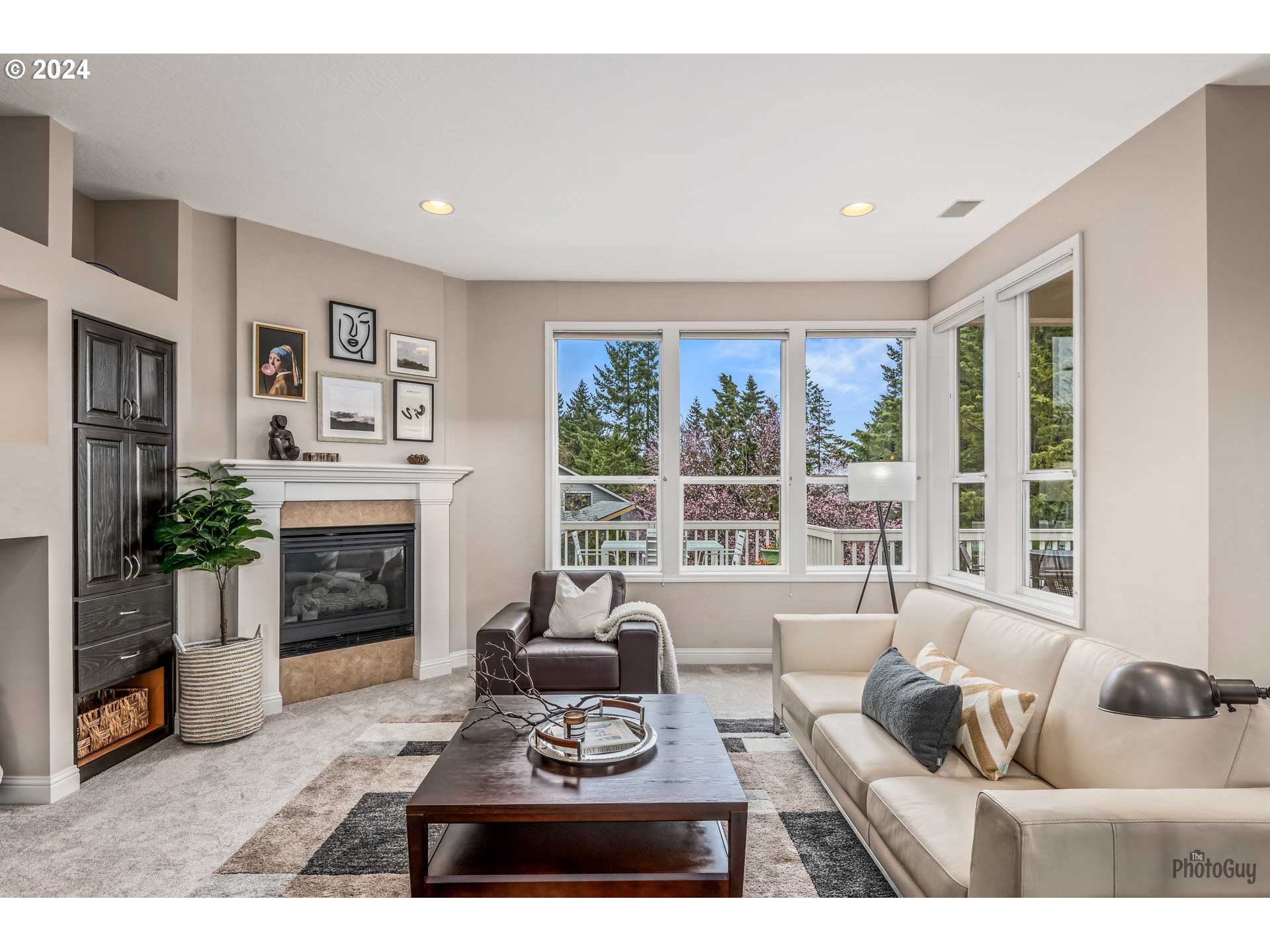 2054 Morning View Drive Eugene, OR 97405 - Photo 24 of 48 a living room with furniture and a fireplace
