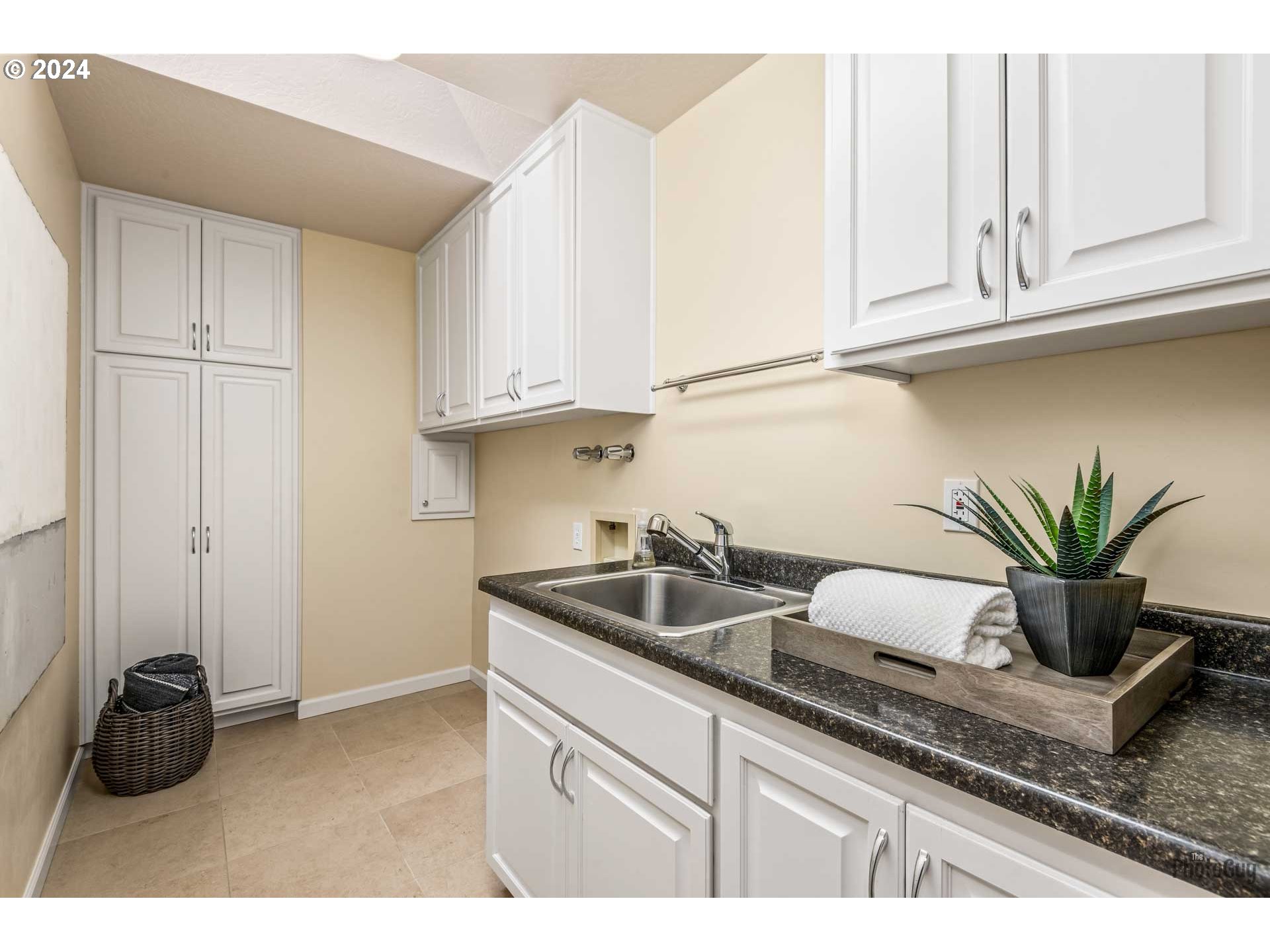 2054 Morning View Drive Eugene, OR 97405 - Photo 36 of 48 a kitchen with stainless steel appliances granite countertop a sink a stove and cabinets