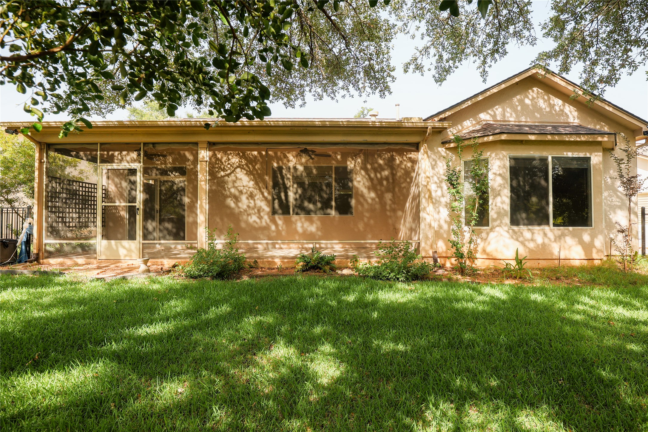 225 Red Poppy Trail Georgetown, TX 78633 - Photo 2 of 15 A private, screened patio to enjoy the fenced yard