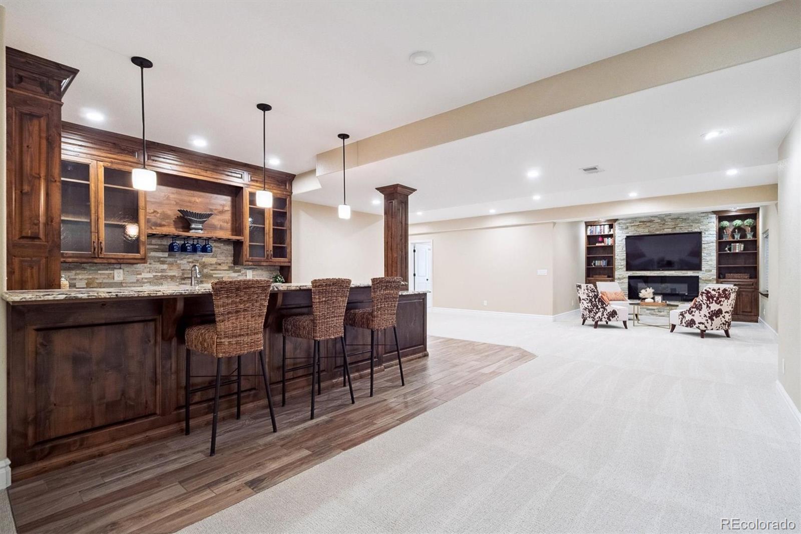470 Maplehurst Drive Highlands Ranch, CO 80126 - Photo 26 of 46 a view of a dining room with furniture