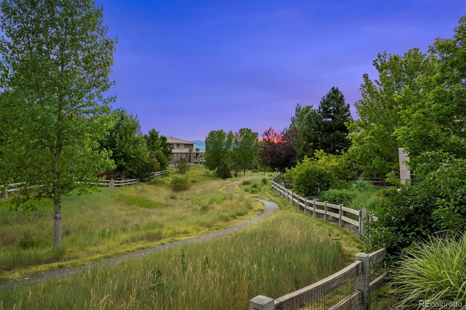 470 Maplehurst Drive Highlands Ranch, CO 80126 - Photo 36 of 46 a yard with trees in the background