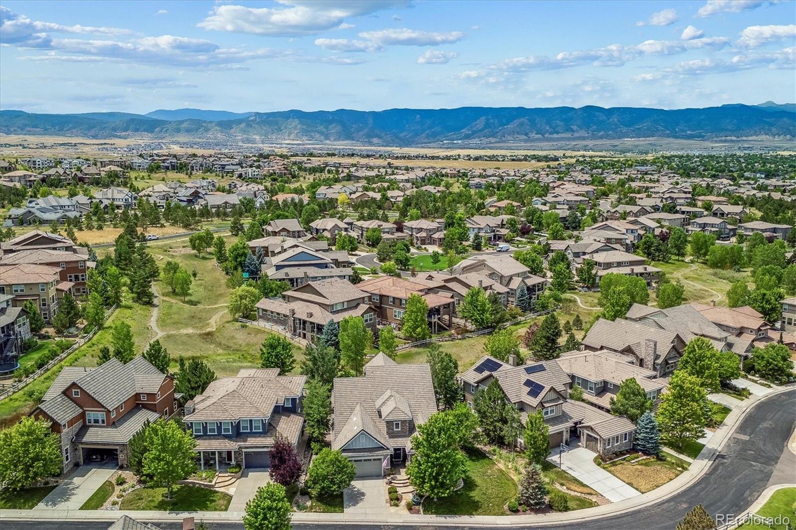 470 Maplehurst Drive Highlands Ranch, CO 80126 - Photo 44 of 46 an aerial view of residential house and lake