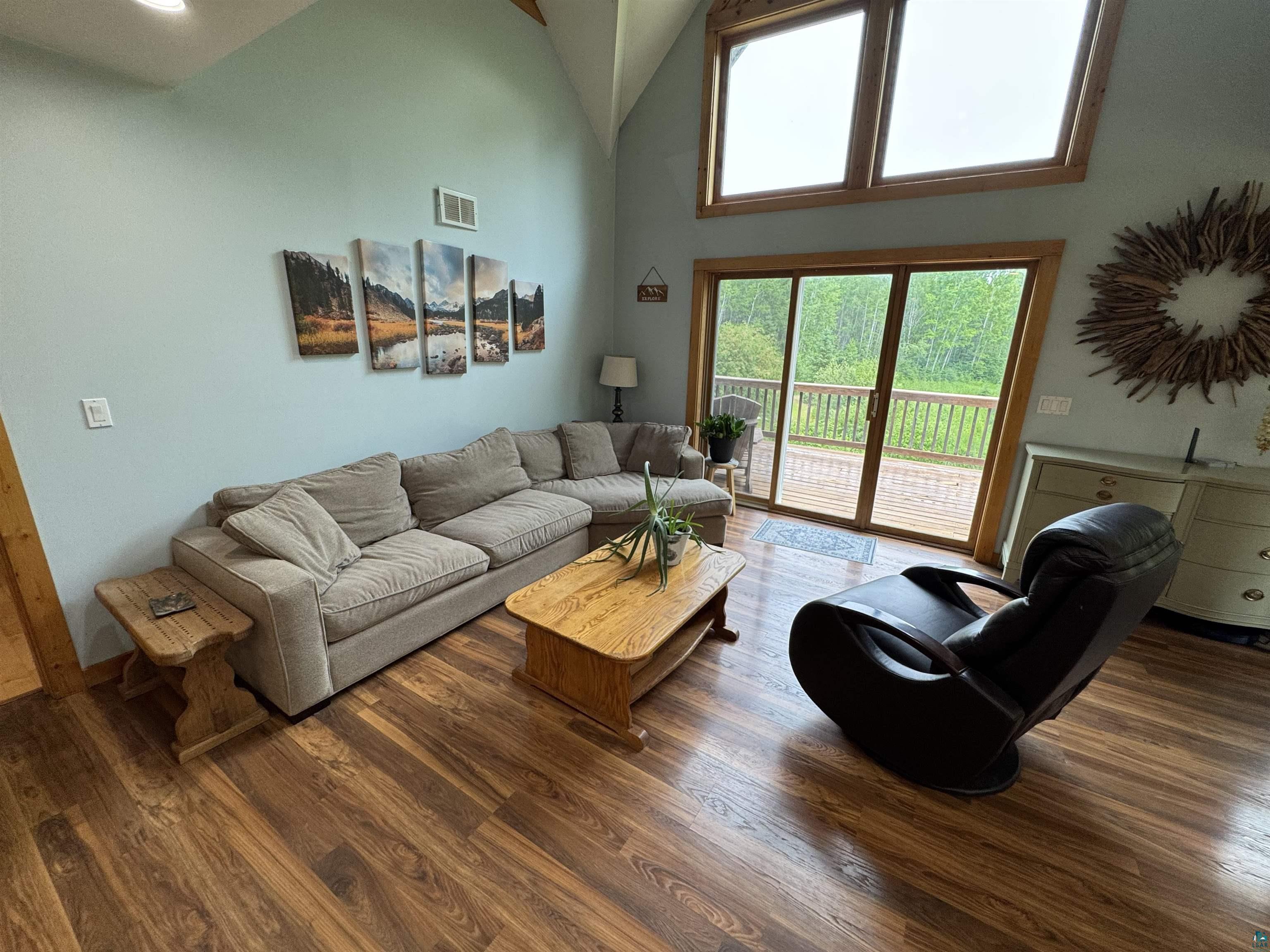 1745 Becks Road Maple, WI 54854 - Photo 14 of 46 Vaulted ceiling room with wood-finish flooring