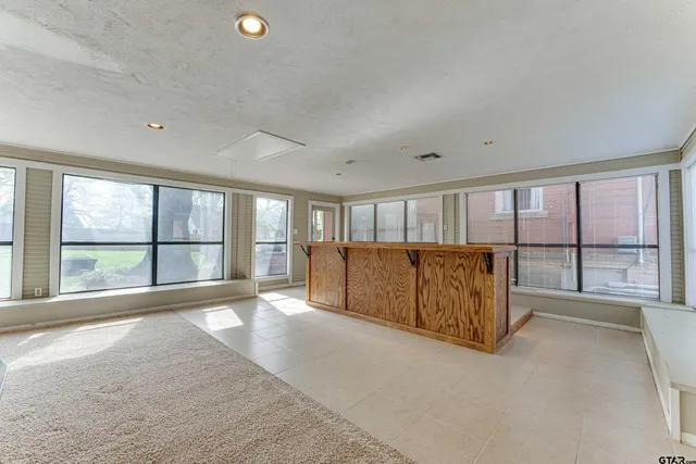 a view of a house with wooden floor
