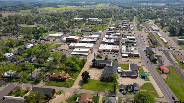 a view of a hallway with an entryway