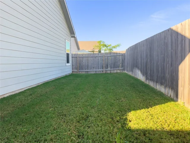 a view of a backyard with a garden