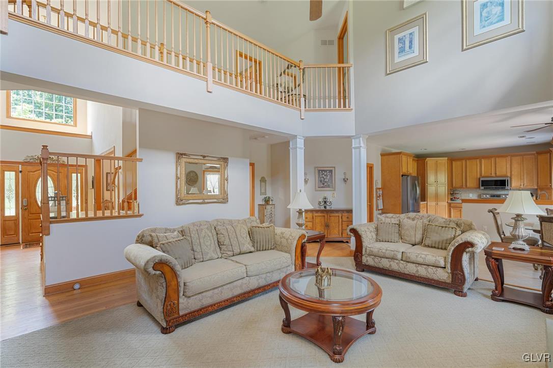 220 West Butternut Road Hellertown, PA 18055 - Photo 18 of 50 a living room with furniture a couch and a large window