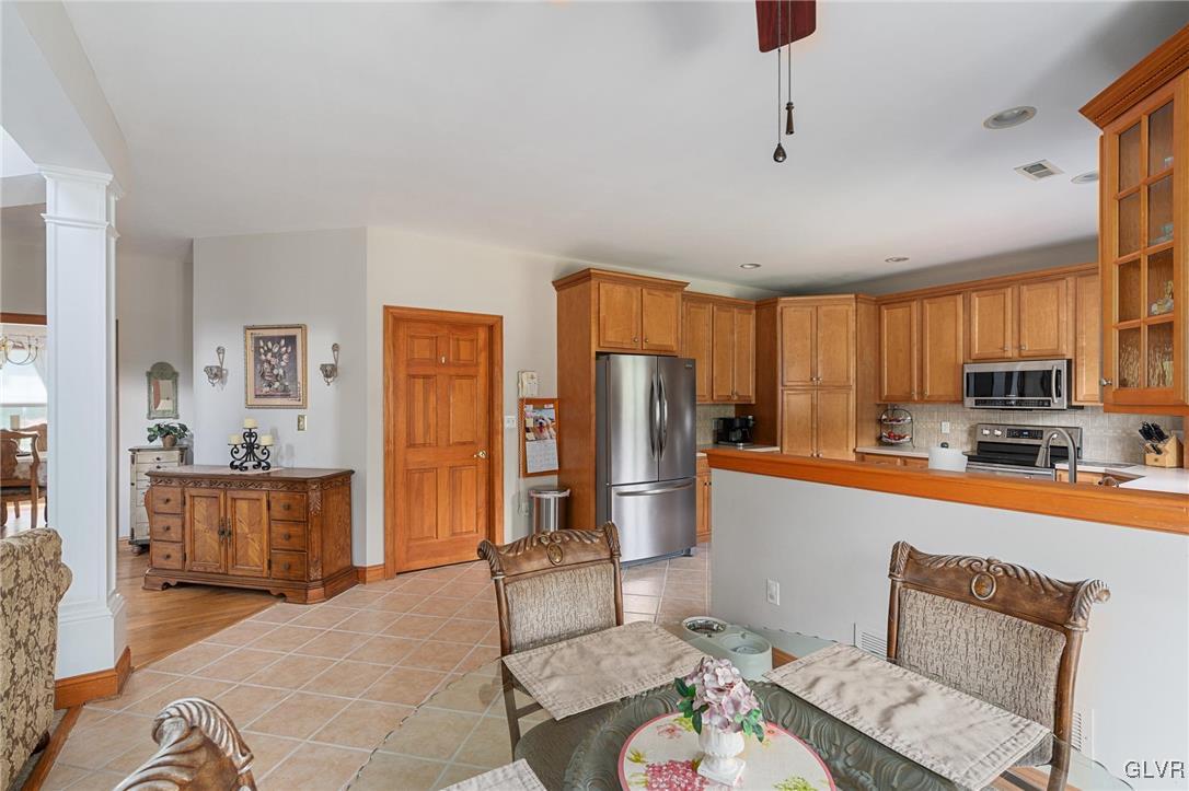 220 West Butternut Road Hellertown, PA 18055 - Photo 21 of 50 a living room with furniture and a open kitchen view
