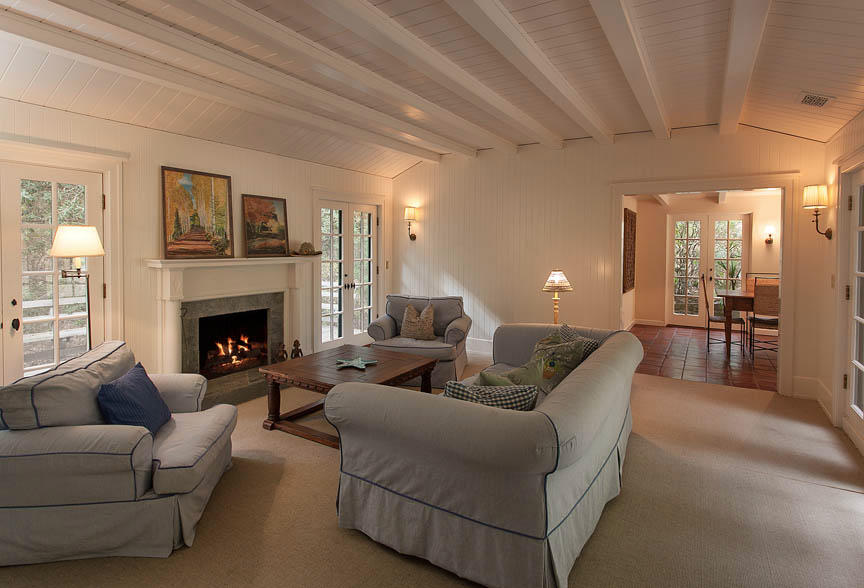 930 Lilac Drive Montecito, CA 93108 - Photo 17 of 25 a living room with furniture and a fireplace