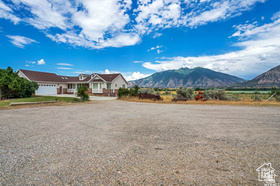 19 East Southfield Road Spanish Fork, UT 84660 - Photo 57 of 74 View of front of house with a mountain view