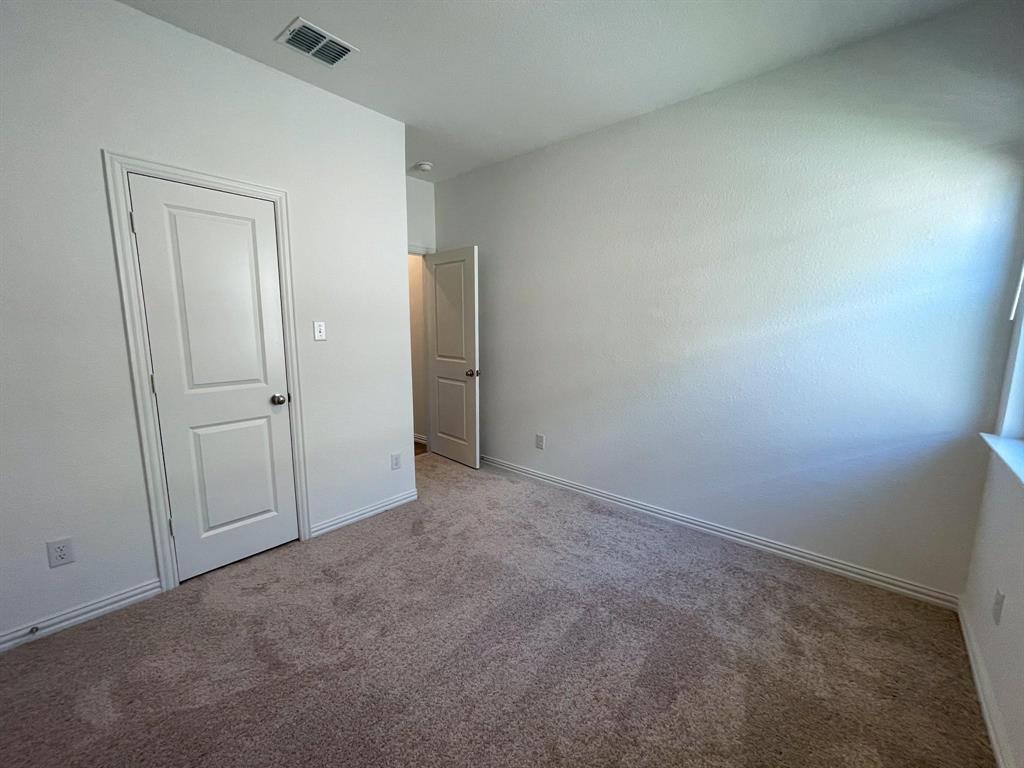 3305 Tulip Poplar Trail McKinney, TX 75071 - Photo 12 of 29 an empty room with closet area
