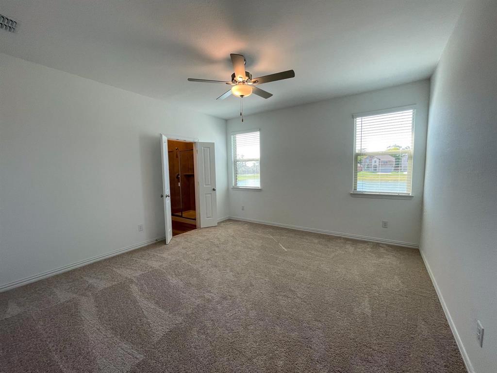3305 Tulip Poplar Trail McKinney, TX 75071 - Photo 20 of 29 a view of an empty room with a window