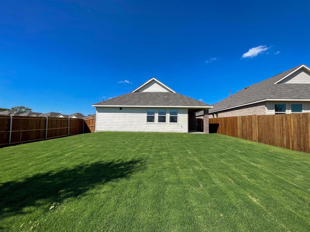 3305 Tulip Poplar Trail McKinney, TX 75071 - Photo 28 of 29 a front view of a house with a yard