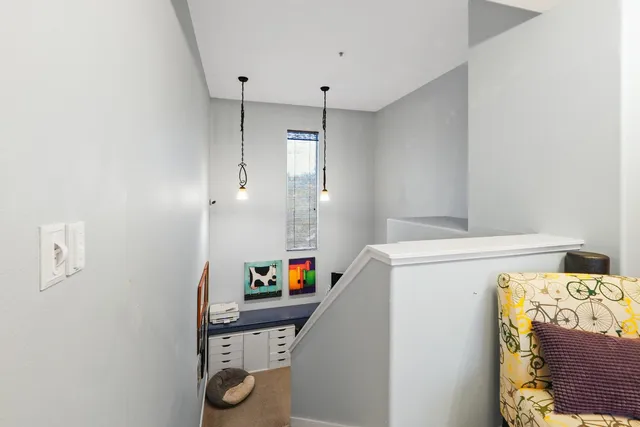 a bed room with a bed and a television