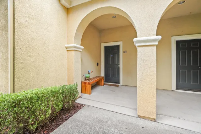 a view of a building with barbeque area