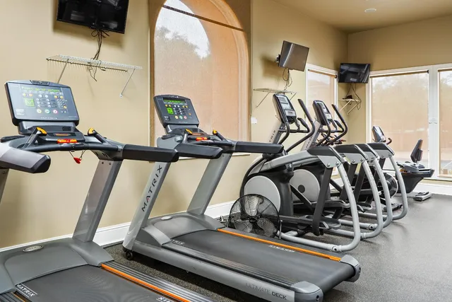 a view of an chairs and tables in the patio