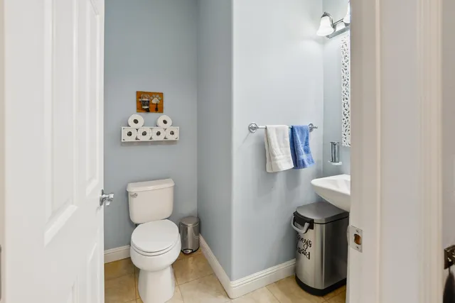 a bathroom with a toilet and a sink