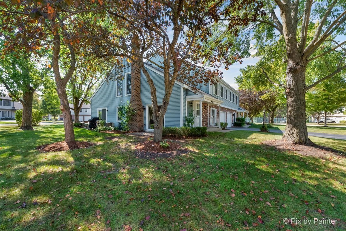 11727 Davey Drive, Unit B Huntley, IL 60142 - Photo 23 of 25 a view of a house with yard and tree s