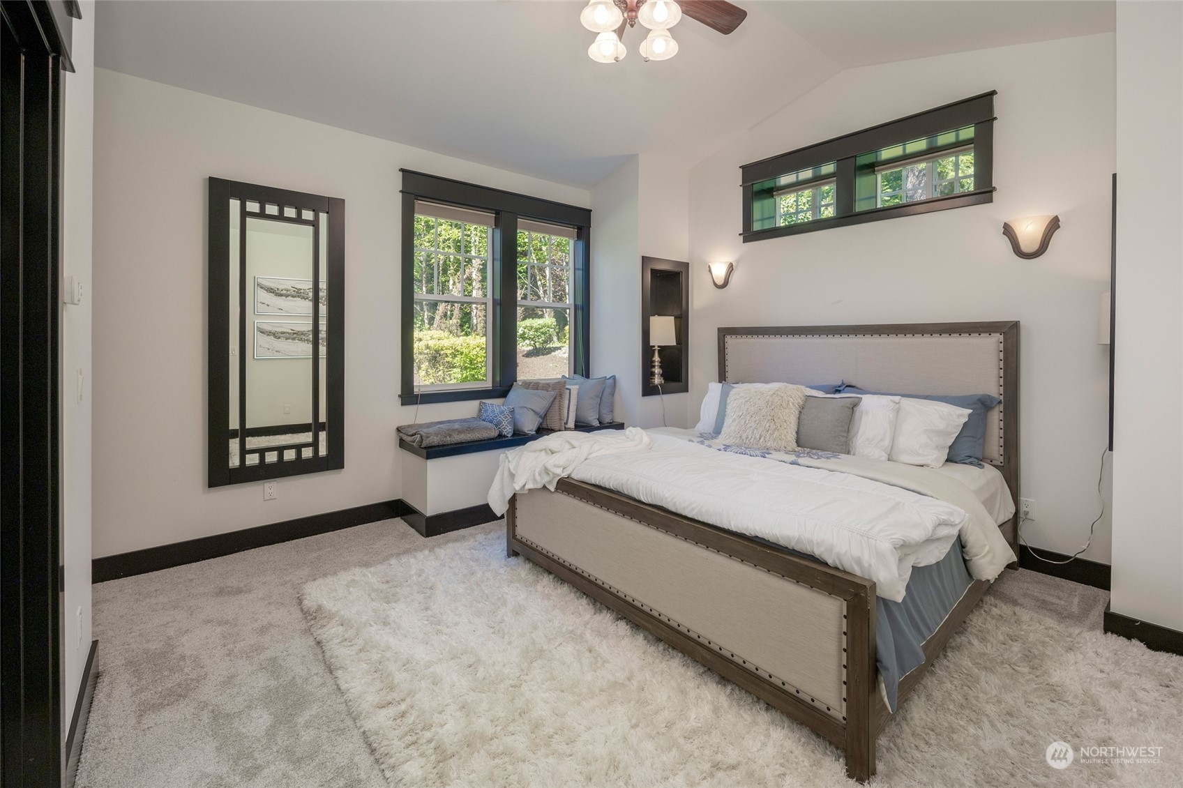 25635 Southeast Old Black Nugget Road Issaquah, WA 98029 - Photo 17 of 39 a spacious bedroom with a bed and a large window