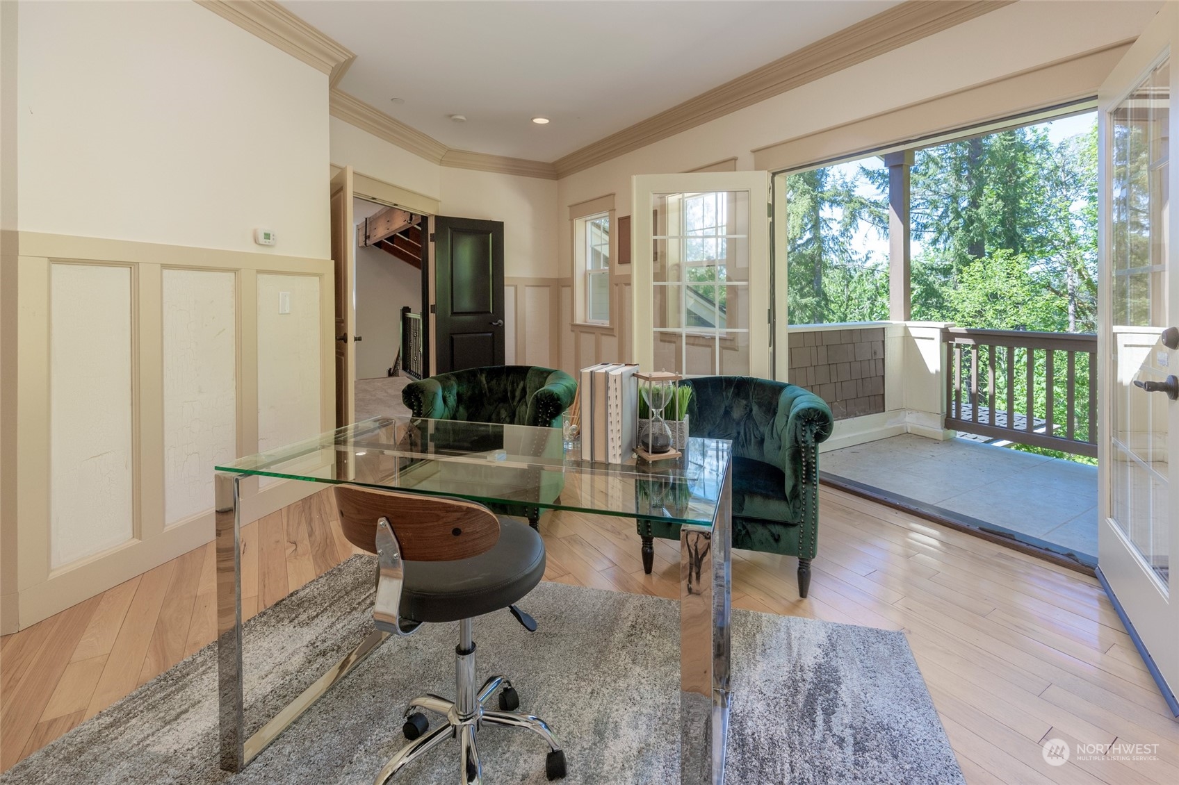 25635 Southeast Old Black Nugget Road Issaquah, WA 98029 - Photo 30 of 39 a living room with furniture large window and wooden floor