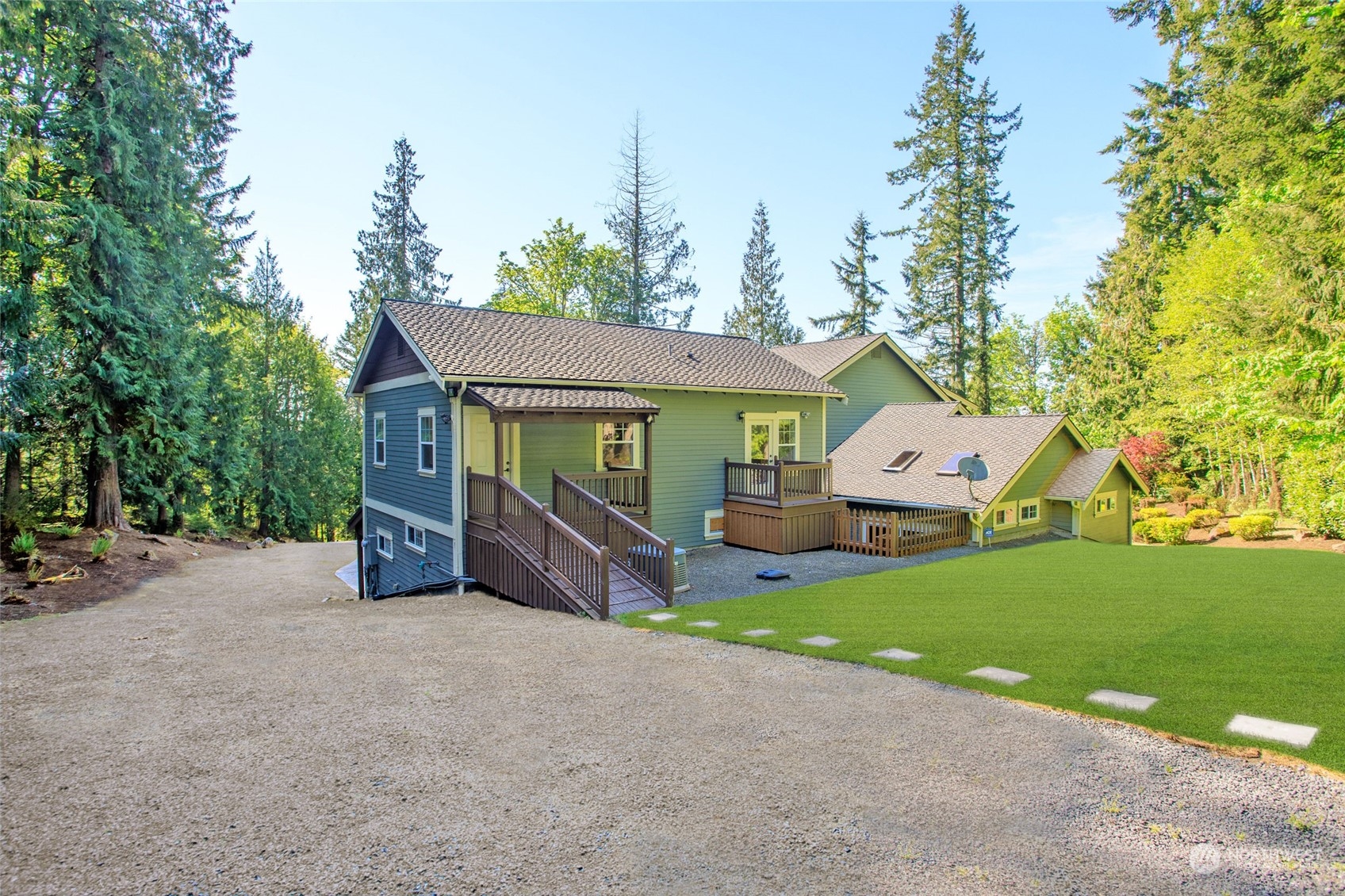 25635 Southeast Old Black Nugget Road Issaquah, WA 98029 - Photo 32 of 39 a view of a house with a yard and sitting area