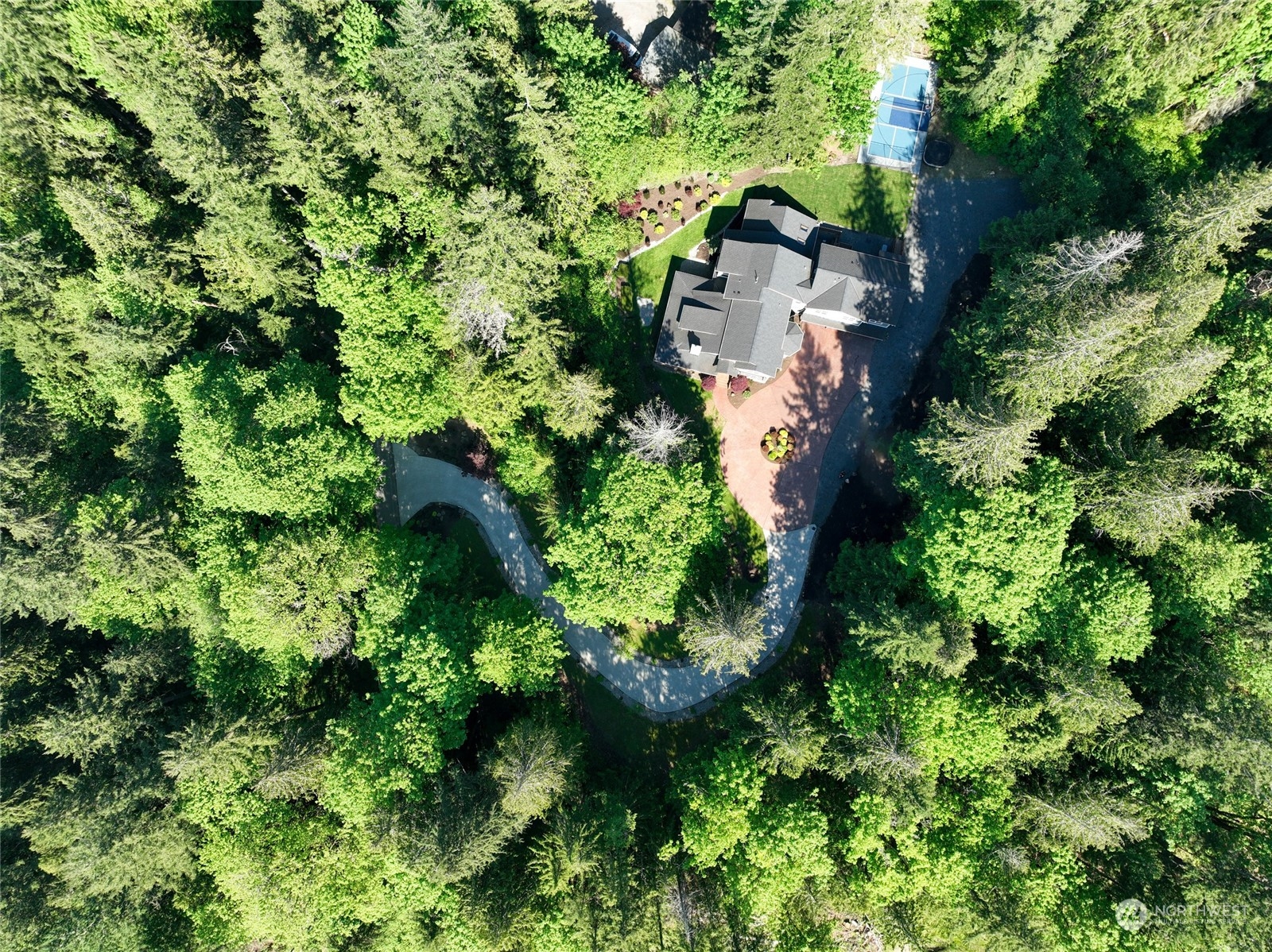 25635 Southeast Old Black Nugget Road Issaquah, WA 98029 - Photo 4 of 39 an aerial view of residential house with outdoor space and trees all around