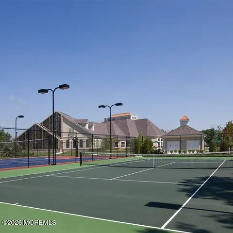 a room with furniture and a large window