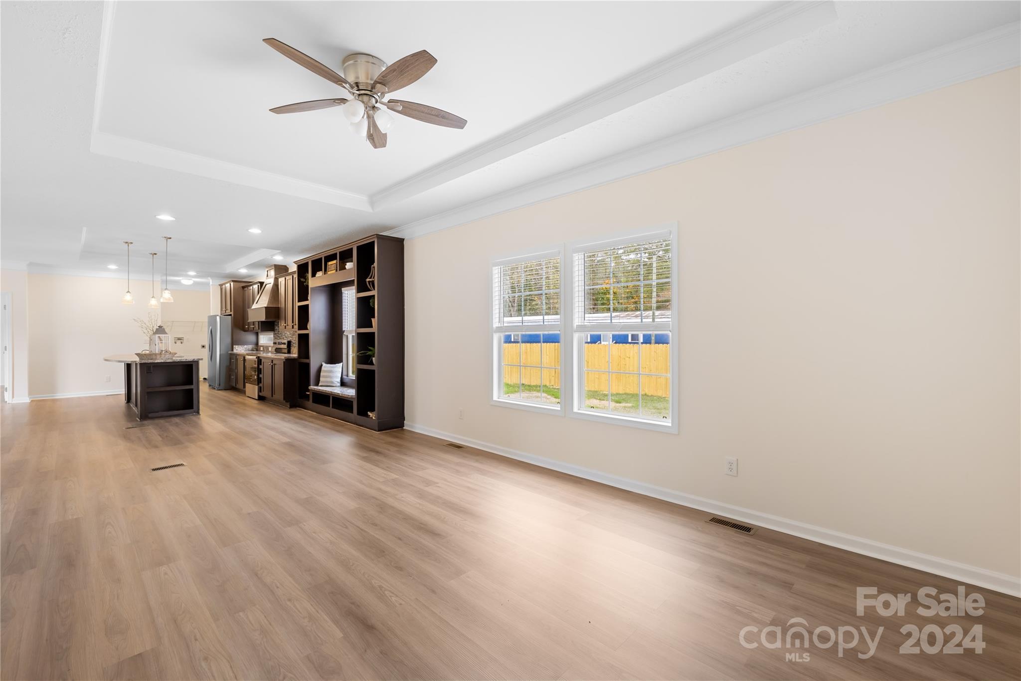 2476 Cimarron Circle Midland, NC 28107 - Photo 13 of 34 wooden floor in an empty room with a window