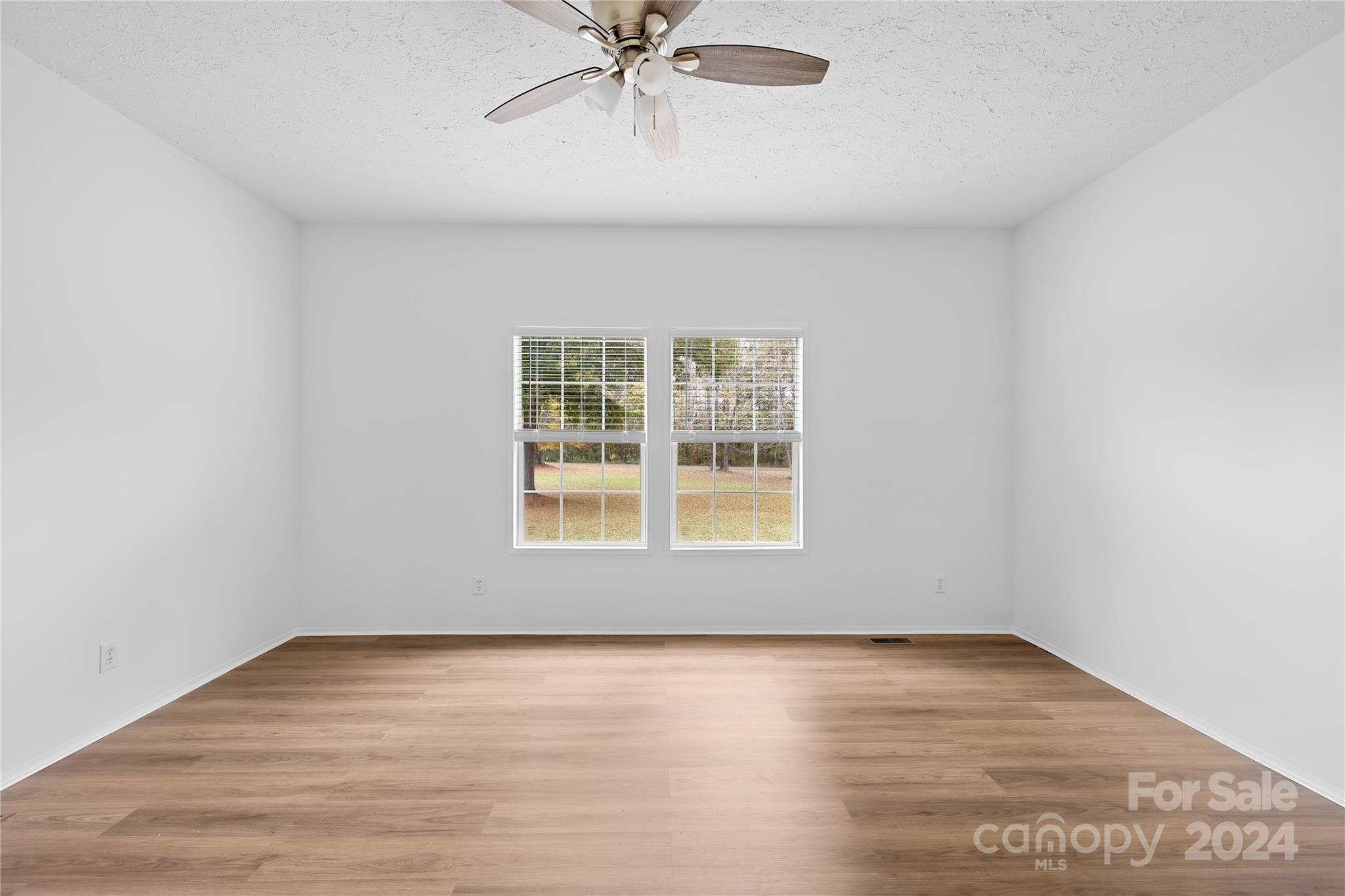 2476 Cimarron Circle Midland, NC 28107 - Photo 17 of 34 a view of an empty room with a window