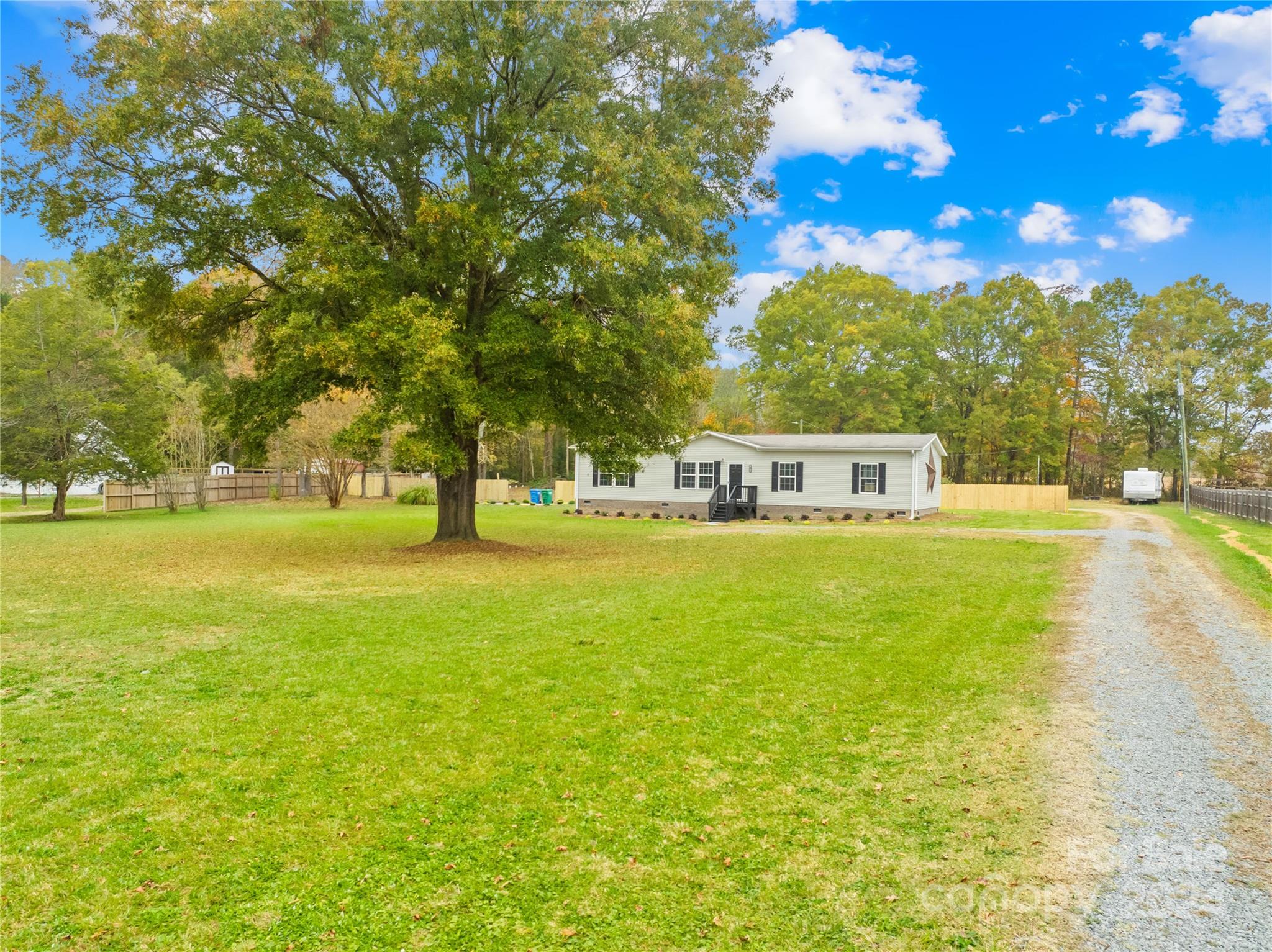 2476 Cimarron Circle Midland, NC 28107 - Photo 26 of 34 a house view with swimming pool