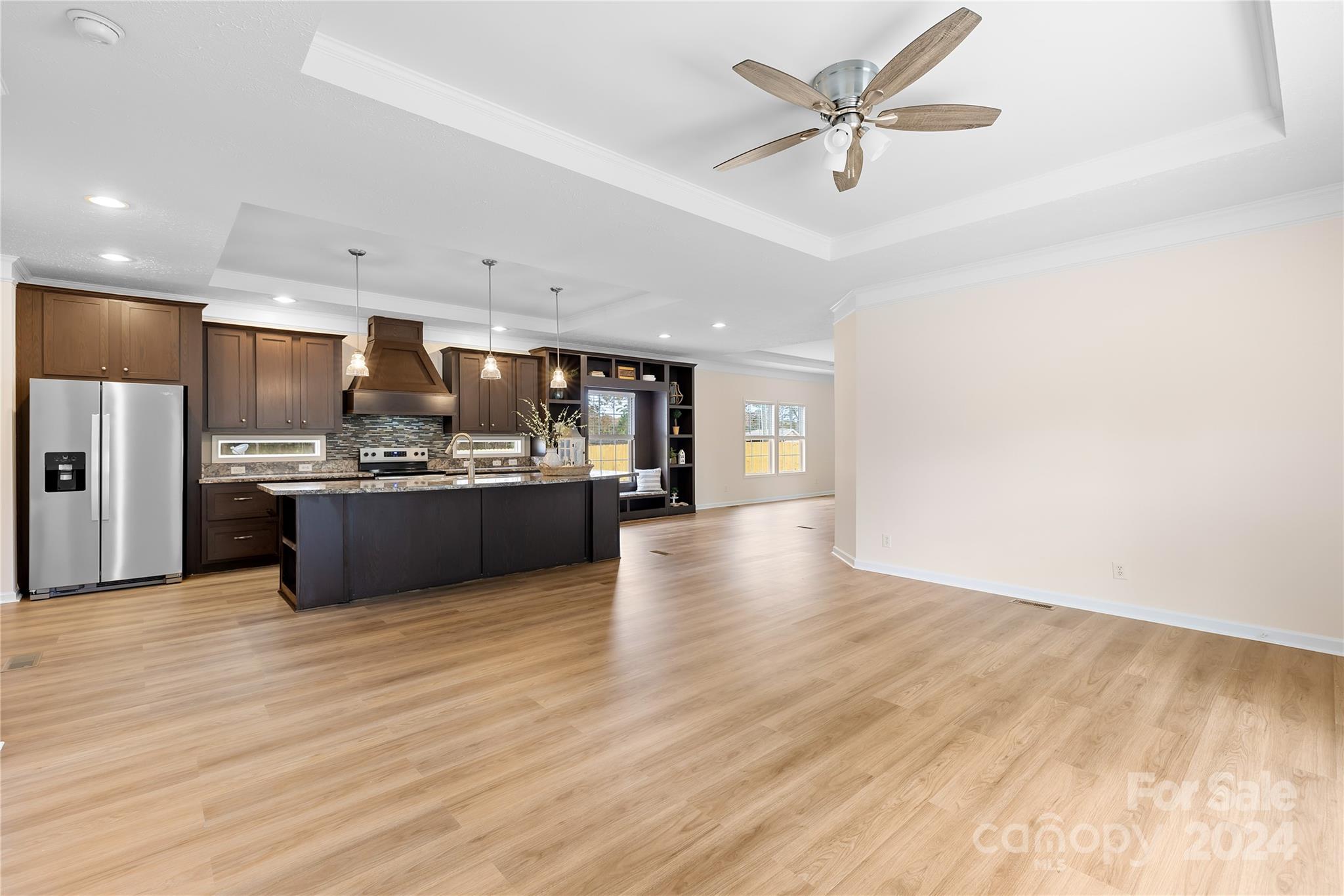 2476 Cimarron Circle Midland, NC 28107 - Photo 6 of 34 a view of kitchen with kitchen island a sink appliances and cabinets