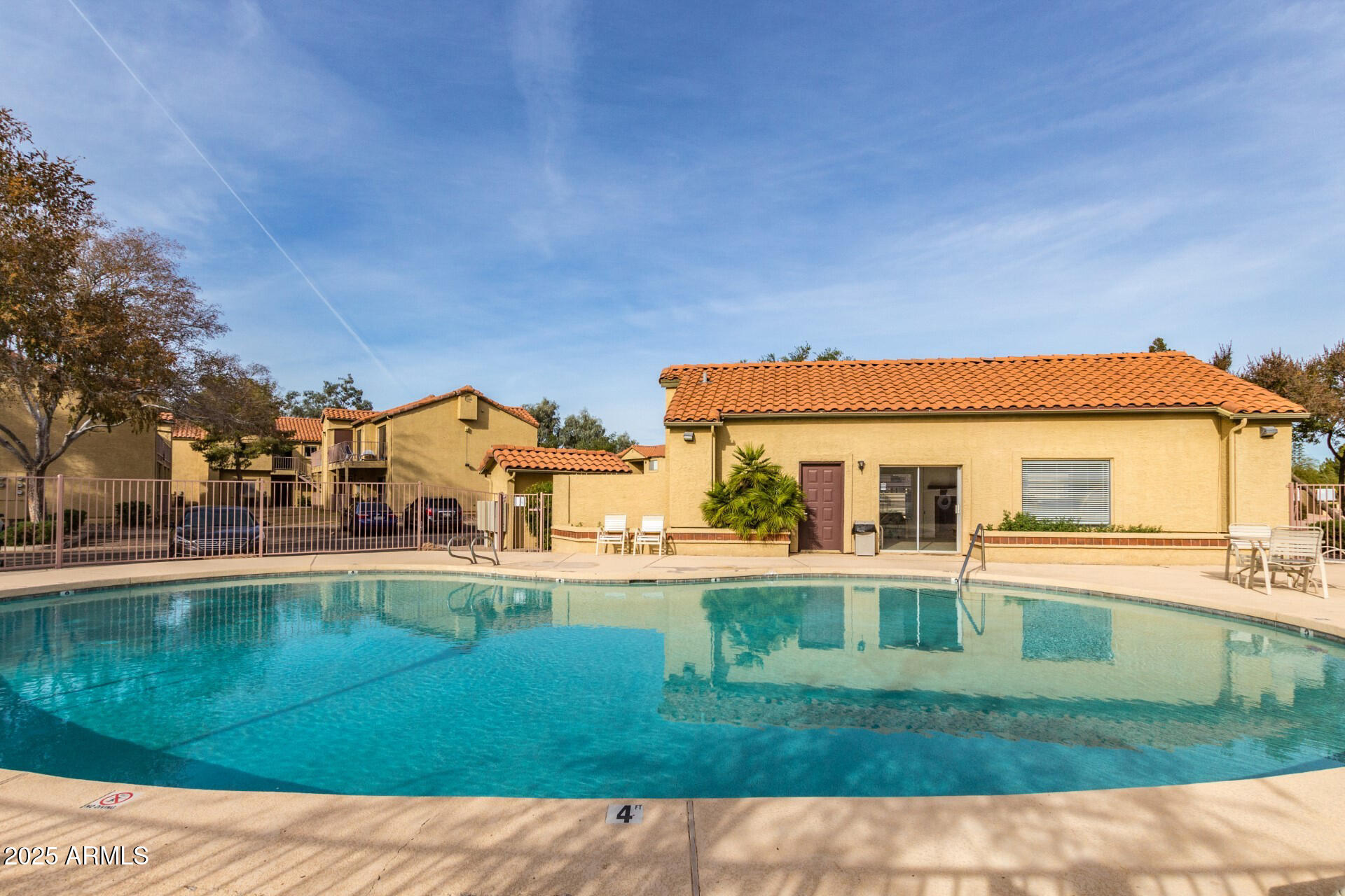 653 West Guadalupe Road, Unit 1121 Mesa, AZ 85210 - Photo 21 of 27 a front view of a house with a yard